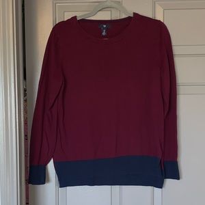 Maroon sweater.